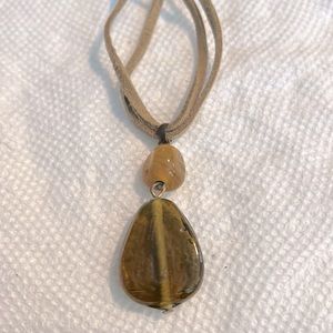 Brown stone pendant with brown leather chain